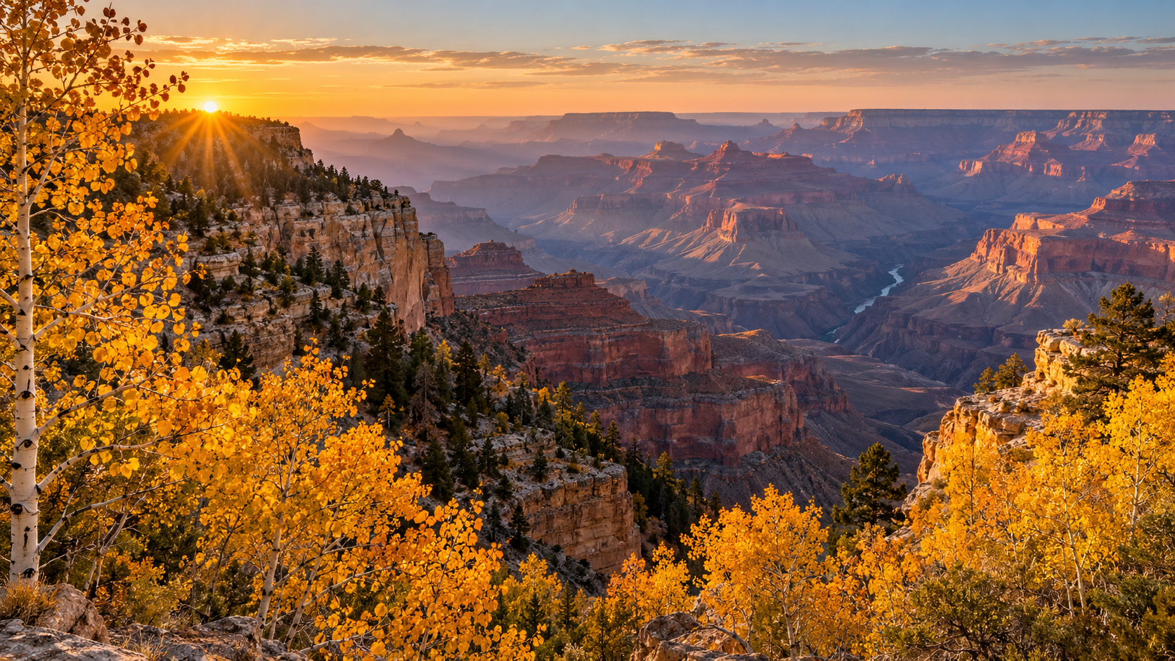 Golden aspens frame a sunrise view across the Grand Canyon from the North Rim in fall.